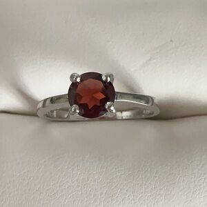 Elegant Silver Ring with Red Gemstone